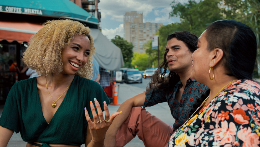 Woman talking to two friends